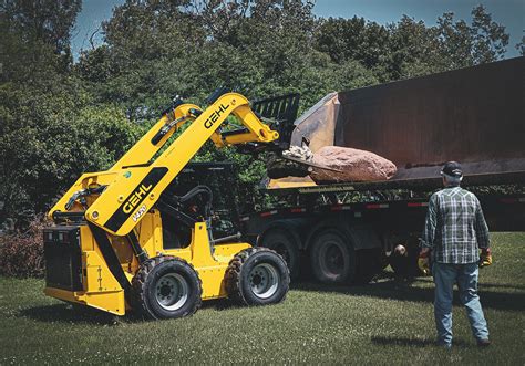 what is a skid-steer|lifting a skid steer.